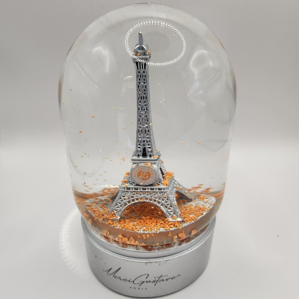 Merci Gustave Snow Globe Eiffel Tower Silver Base Orange Glitter